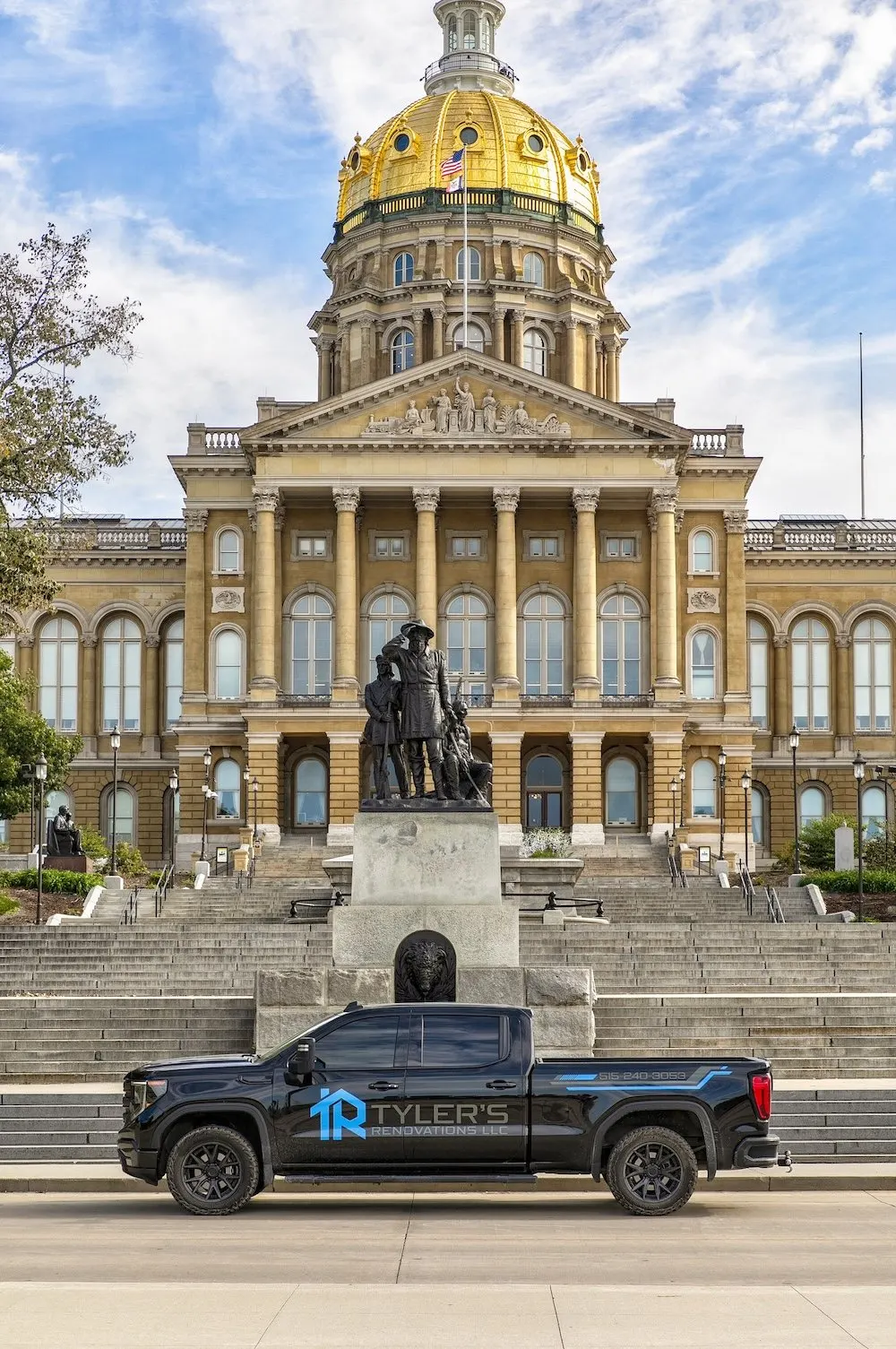 Branded Tyler's Renovations truck with the Iowa State Capitol in the background